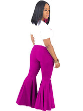 Pantalones acampanados de pierna ancha de color liso